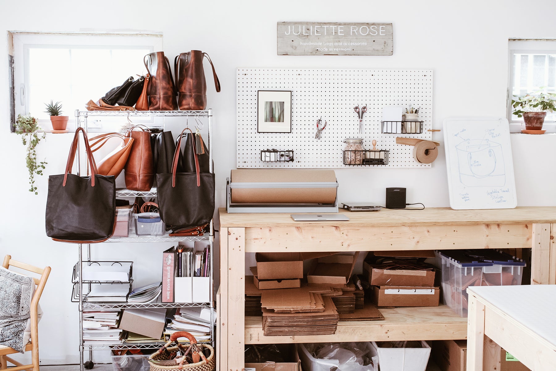 Juliette Rose Designs studio with leather handbags on display