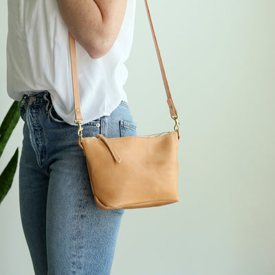 small beige undyed vegetable tanned leather shoulder bag purse with top zipper and removable strap. Converts to a clutch, handmade by Juliette Rose Designs